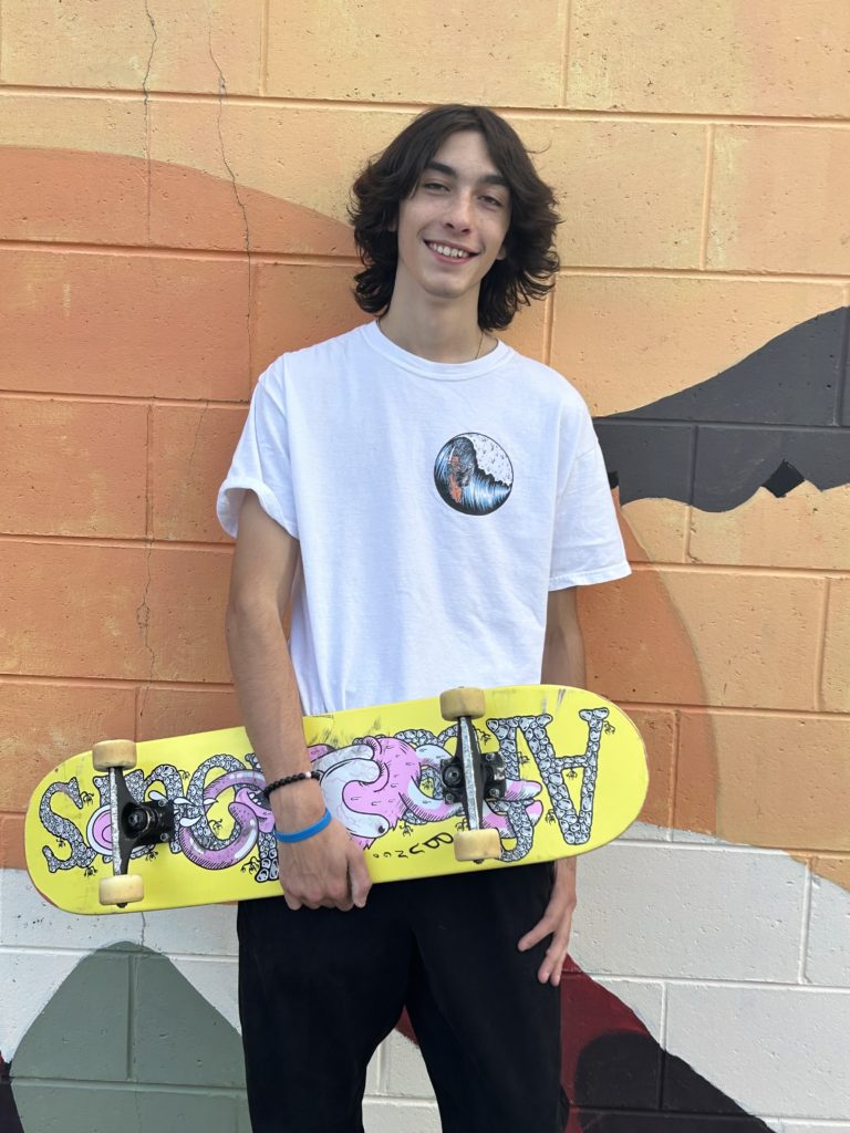 Ronan Holding his skateboard